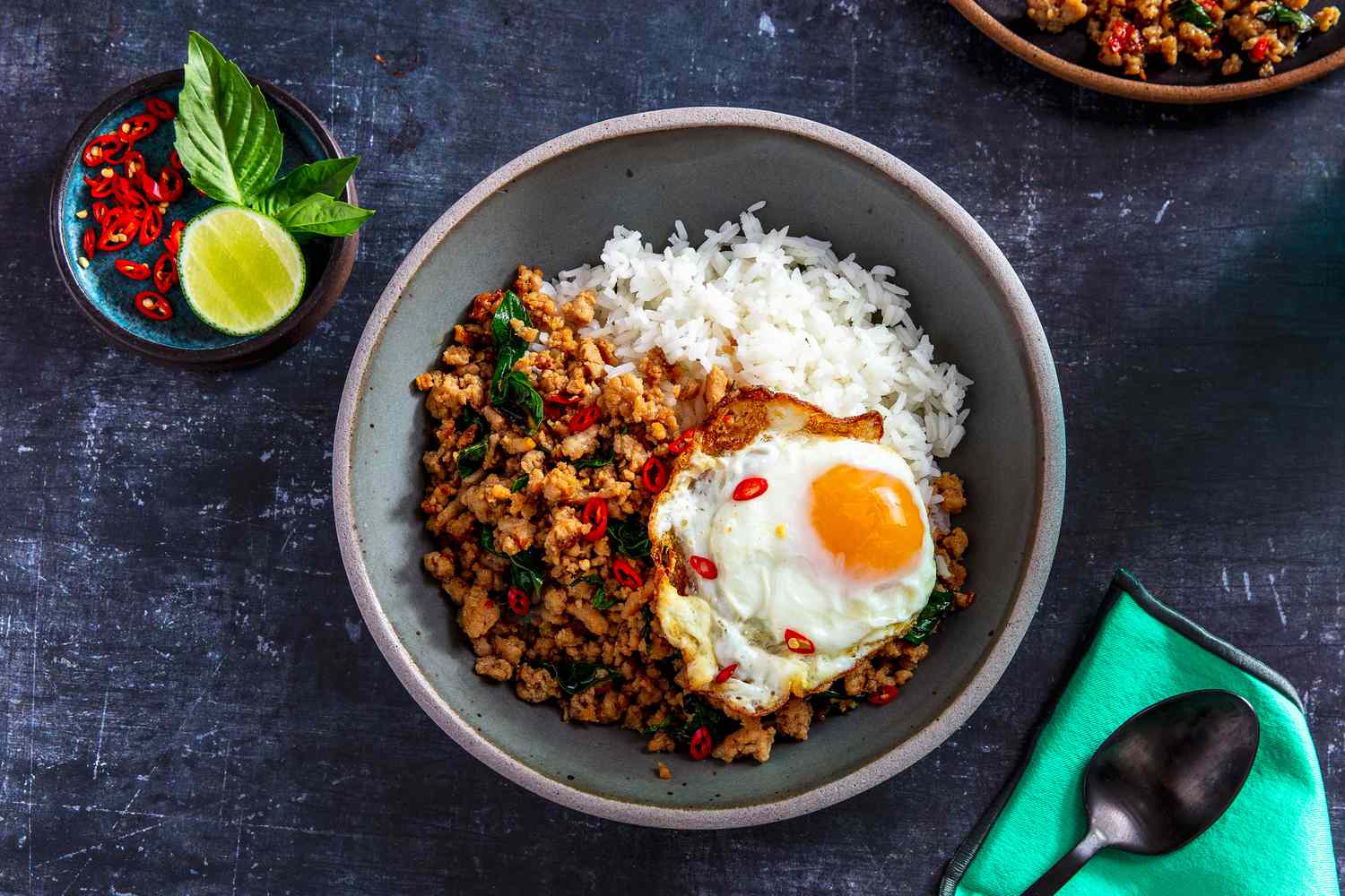 Delicious Pad Kaprao on a grey table